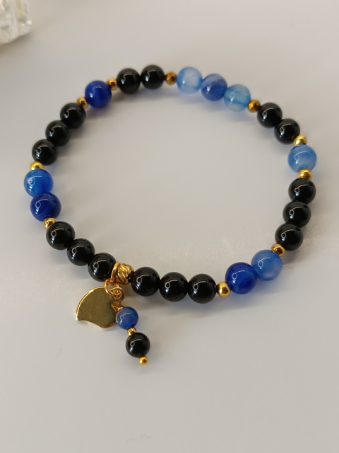 Ręcznie wykonana bransoletka z turmalinem i lapis lazuli – energia i elegancja Ręcznie wykonana bransoletka z turmalinem i lapis lazuli – energia i elegancja